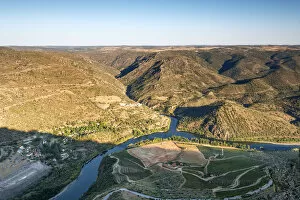 Douro river between Portugal and Spain, in the evening. Portugal on the foreground