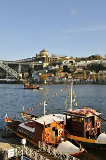 Ribeira Prints: The Douro river and touristic boats to make daily trips along the river. Oporto, Portugal