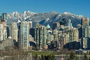 Downtown skyline with snowy mountains behind, Vancouver, British Columbia, Canada