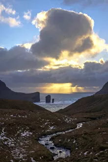 Images Dated 27th January 2022: Drangarnir sea stacks at sunset. Faroe Islands