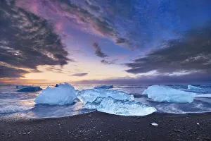 Ice Block Prints: Drift ice on lava beach - Iceland, Eastern Region, Jokulsarlon - Vatnajokull National