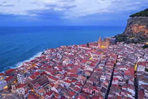 City Centre Prints: Drone view of the ancient illuminated sea village of Cefalu with the cathedral surrounding buildings