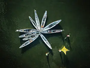 Straight Down Prints: Drone view of fishermen with traditional boats and nets