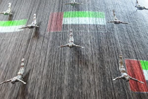 The Dubai Mall, Diving men sculpture & projected UAE flag, diving art statues