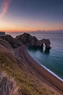 Images Dated 7th February 2023: Durdle Door at Dawn, Jurassic Coast, Dorset, England
