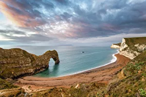 Durdle Door at sunrise, Jurassic Coast, Dorset, England