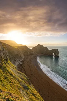 Durdle Door at sunrise, Jurassic Coast, Dorset, England