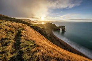 Natural Arch Prints: Durdle Door at sunrise, Jurassic Coast World Heritage Site, Dorset, England, UK