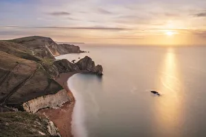 Durdle Door at sunrise from Swyre Head, Lulworth, Isle of Purbeck