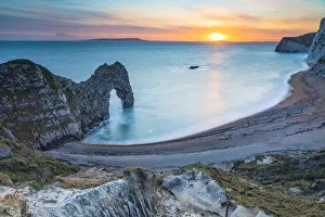 Durdle Door at sunset, West Lulworth, Dorset, England, UK