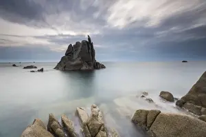 Province Of Sassari Prints: Dusk on modeled cliffs by wind framing blue sea Capo Testa Santa Teresa di Gallura