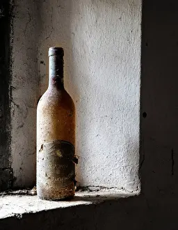 Pienza Prints: dust-covered wine bottle in a derelict farmhouse, Cosona, near Pienza, Tuscany, Italy