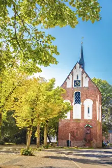 Market Place Prints: Early Gothic bell tower of the Ludgeri Church on the market square in Norden