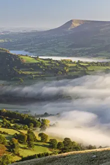 Brecon Beacons Prints: Early morning mist rolls over patchwork countryside in the Brecon Beacons National Park