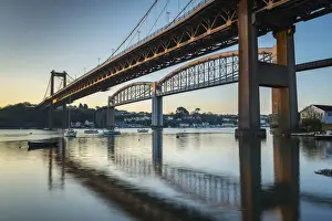 Early morning sun lights up the Tamar Bridge and Royal Albert Bridge