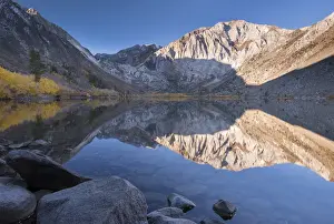 Early Morning Prints: Early morning sunshine lights the Eastern Sierra Mountains beyond Convict Lake, California
