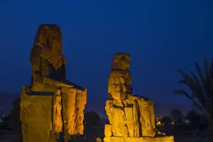 Egypt, Luxor, West Bank, Colossi of Memnan at The mortuary temple of Amenhotep 111