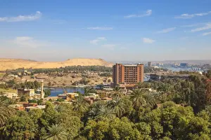 Movenpick Prints: Egypt, Upper Egypt, Aswan, View of New and old Cataract Hotel with Khnum ruins in