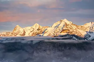 Birg Prints: Eiger, Monch and Jungfrau mountains emerging from fog at sunset