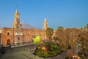 Bell Towers Prints: El Misti volcano rising above Basilica Cathedral of Arequipa at Plaza de Armas Square at twilight