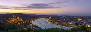 Elevated view over Budapest & the River Danube illuminated at sunset, Budapest