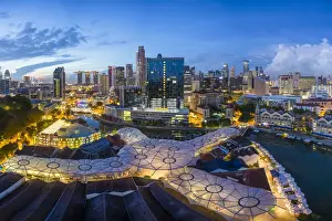 Eating Out Prints: Elevated view over the city skyline and riverside restaurants at the entertainment