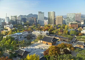 Elevated view of Deoksugung Palace and skyscrapers, Seoul, South Korea
