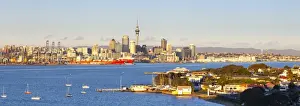 Elevated View Over Devenport towards Central Business District illuminated at sunrise, Auckland, New Zealand