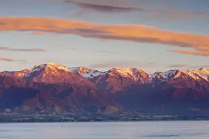 Images Dated 31st March 2014: Elevated view over dramatic landscape illuminated at sunrise, Kaikoura, South Island