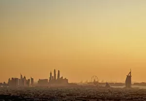 Elevated view towards Dubai Marina and Burj Al Arab Hotel at sunset, Dubai, United
