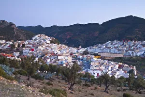Images Dated 2nd August 2012: Elevated view over the historic hilltop town of Moulay Idriss illuminated at sunset