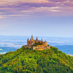 Elevated view towards Hohenzollern Castle & surrounding countryside at sunrise, Swabia