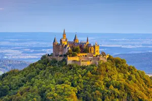 Elevated view towards Hohenzollern Castle & surrounding countryside at sunrise, Swabia