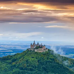 Elevated view towards Hohenzollern Castle & surrounding countryside at sunset, Swabia