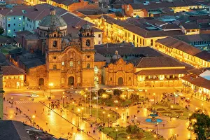 Illumination Prints: Elevated view of illuminated Church of the Society of Jesus and Plaza de Armas Square at twilight