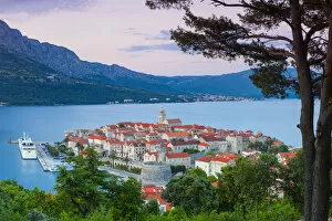 Images Dated 26th August 2014: Elevated view over Korculas picturesque Stari Grad illuminated at dusk, Korcula