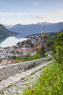 Kotor Collection: Elevated view over Kotors Stari Grad (Old Town) and The Bay of Kotor, Kotor, Montenegro