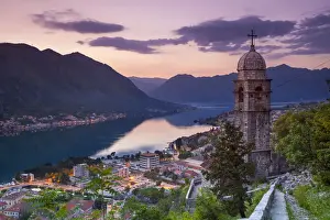 Elevated view over Kotors Stari Grad (Old Town) and The Bay of Kotor illuminated