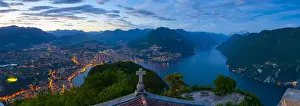 Elevated view over Lugano from Monte San Salvatore illuminated at Dusk, Lake Lugano