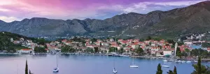 Elevated view over picturesque harbor town of Cavtat illuminated at sunset, Cavtat