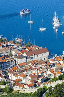 Walled Cities Prints: Elevated view over the picturesque harbour town of Hvar, Hvar, Dalmatia, Croatia