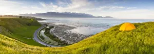 Elevated view over picturesque Kaikoura peninsula illuminated at sunset, Kaikoura