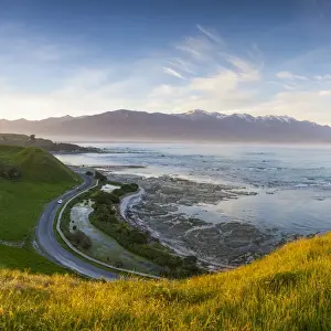 Elevated view over picturesque Kaikoura peninsula illuminated at sunset, Kaikoura