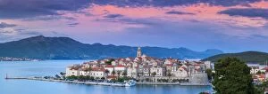 Former Yugoslavia Collection: Elevated view over picturesque Korcula Town illuminated at sunset, Korcula, Dalmatia