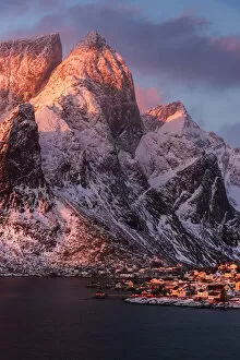 Safari Lodge Gallery: Elevated view of Reine along the coast at sunrise in the Lofoten islands, Norway