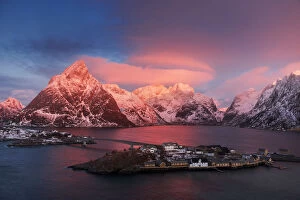 Safari Lodge Gallery: Elevated view of Sakrisoy along the coast at sunrise in the Lofoten islands, Norway