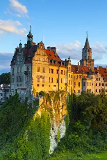 Elevated view towards Sigmaringen Castle illuminated at sunset, Swabia, Baden Wurttemberg