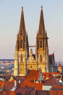 Elevated view towards St. Peters Cathedral illuminated at sunset, Regensburg