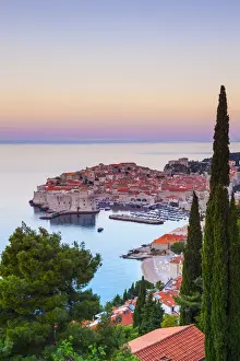 Elevated view over Stari Grad (Old Town) illuminated at sunrise, Dubrovnik, Dalmatia