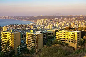 Residential Building Prints: Elevated view of Vina del Mar coastal city seen from Mirador Pablo Neruda at sunset